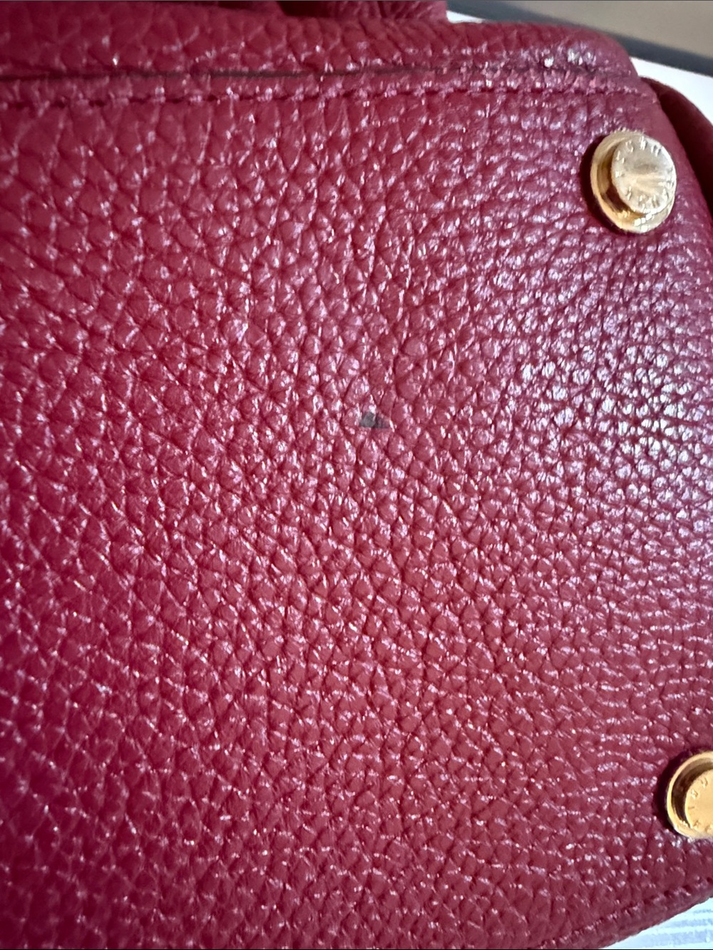 Henri Bendel tote bag features a pebbled texture and gold-toned hardware. - Picture 10 of 11